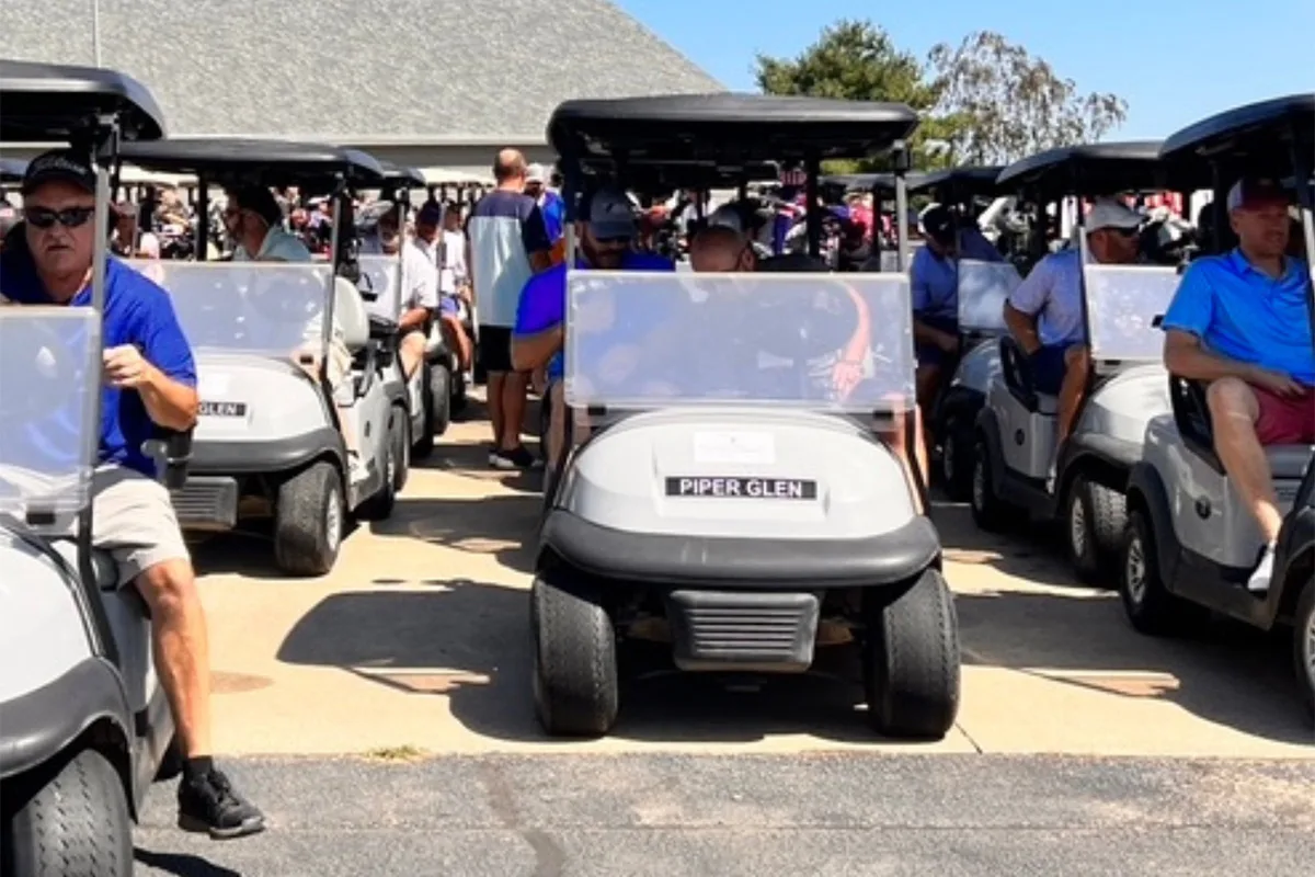 Participants at a Springfield YMCA golf event, enjoying recreational activities while supporting community programs.