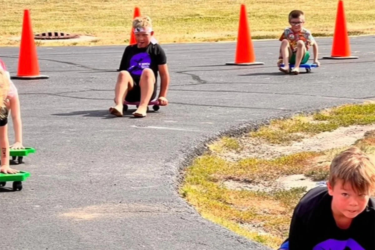 Children participating in a Y Ninja event at Springfield YMCA, developing agility and fitness in a fun environment.