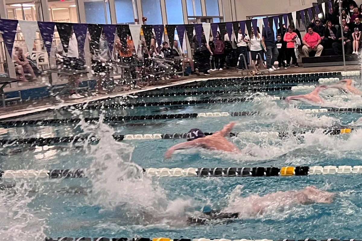 Youth learning to swim at Springfield YMCA, focusing on water safety and skill development in a supportive environment.