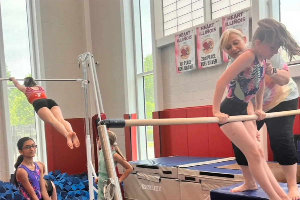 Advanced gymnastics class at Springfield YMCA, where participants hone their skills and prepare for competitions.